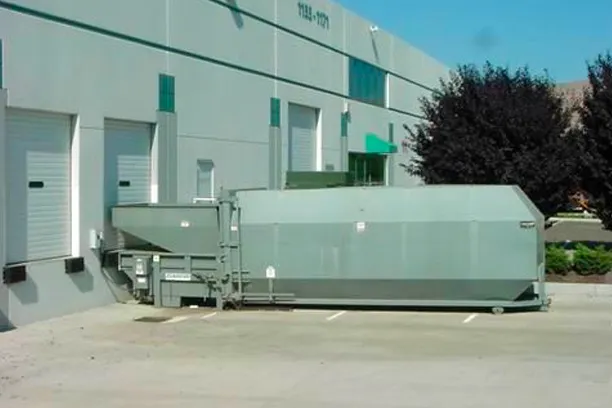 Stationary trash compactor manufactured by WasteMind